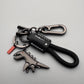 Dije de dinosaurio de aleación de aluminio combinado con una pulsera tejida a mano - 🔥Segundo artículo con un 40 % de descuento