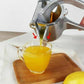 🍊✨ ¡OFERTA 50% OFF! Exprimidor Manual de Acero Inoxidable – Jugo Fresco y Saludable en Segundos 🥤
