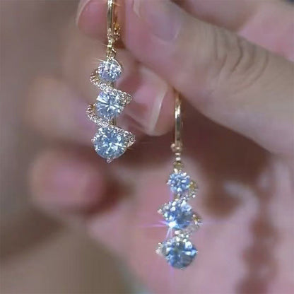 ⏰🔥 ¡OFERTA 50% OFF! 💎✨ Pendientes de Cristal en Espiral Dorada – Diseño Elegante y Brillante para Resaltar tu Belleza en Cada Ocasión 🌟