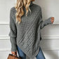 Jersey poncho de punto trenzado para mujer