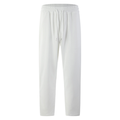 Pantalones casuales de punto gofrado con cordón para hombre