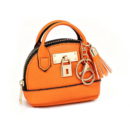 🔥 ¡50% OFF POR TIEMPO LIMITADO! 👜 Llavero de Bolso Mini Forma de Concha – Elegante, Práctico y con Detalles de Lujo ✨