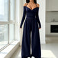 Mono elegante de mujer con cuello halter y escote en V profundo